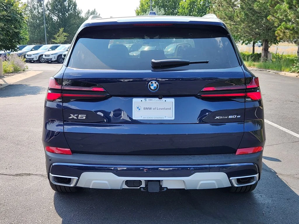 New 2026 Tanzanite Blue II Metallic BMW xDrive50e image 4