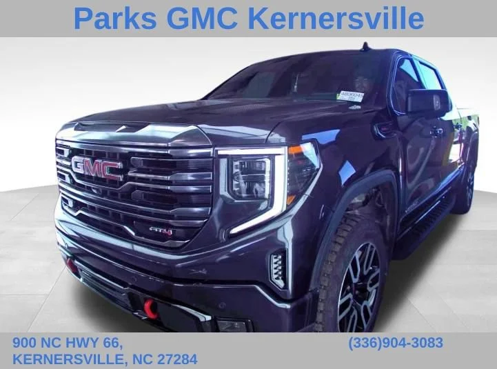 Used 2023 TITANIUM RUSH METALLIC GMC AT4 image 1