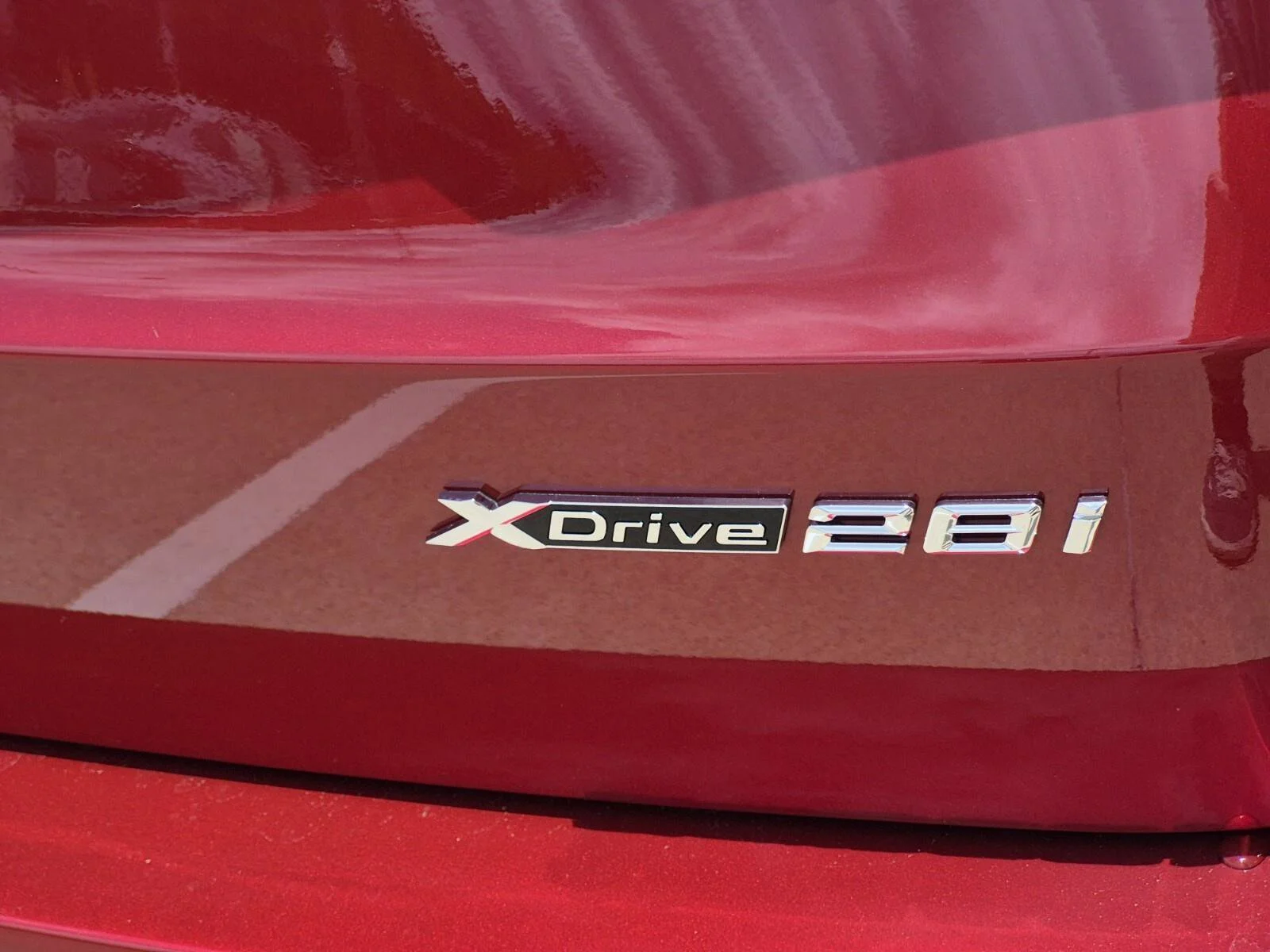 New 2026 Vegas Red Metallic BMW xDrive28i image 8