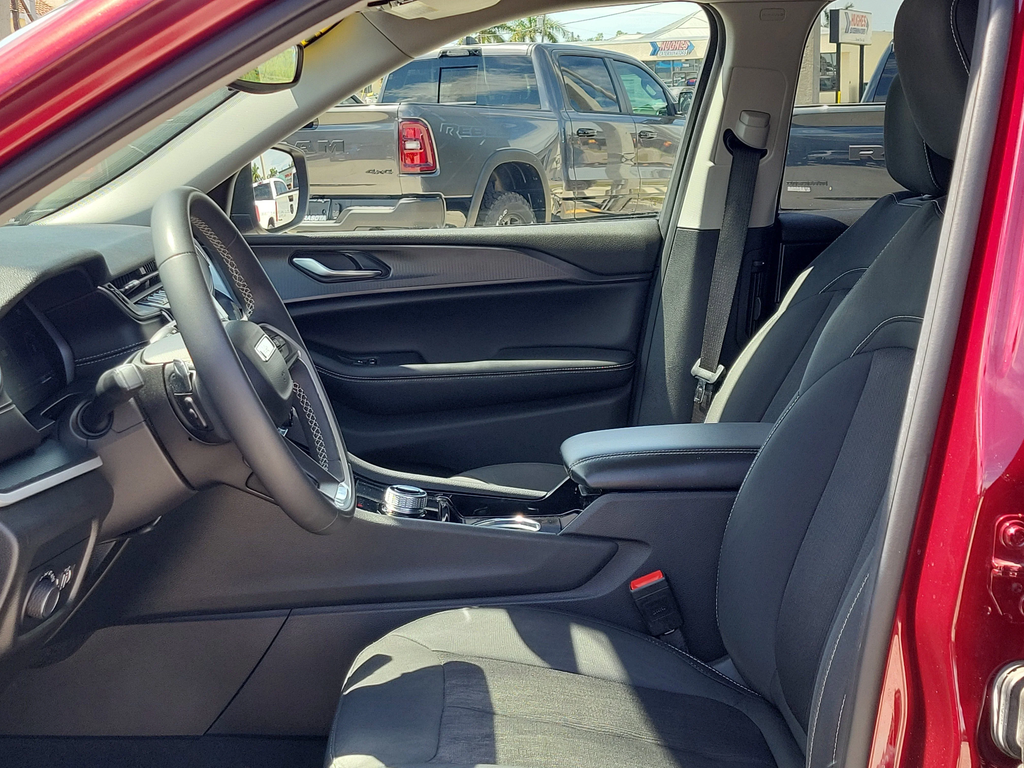 Used 2023 Velvet Red Pearlcoat Jeep Laredo image 23