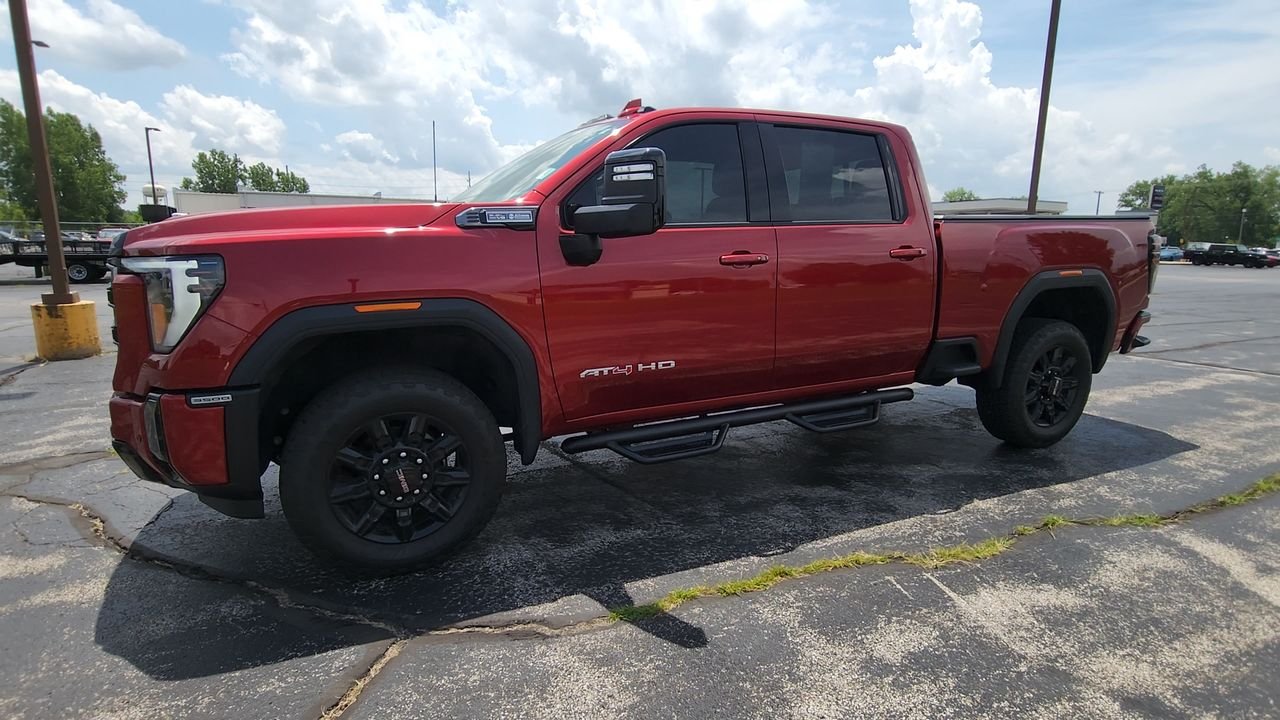 Used 2024 Volcanic Red Tintcoat GMC AT4 image 4