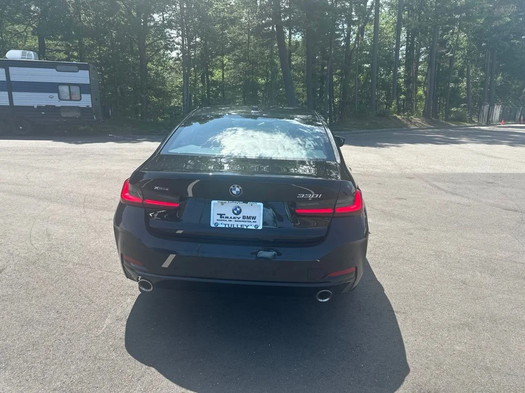 Used 2026 Black Sapphire Metallic BMW 330i xDrive image 6