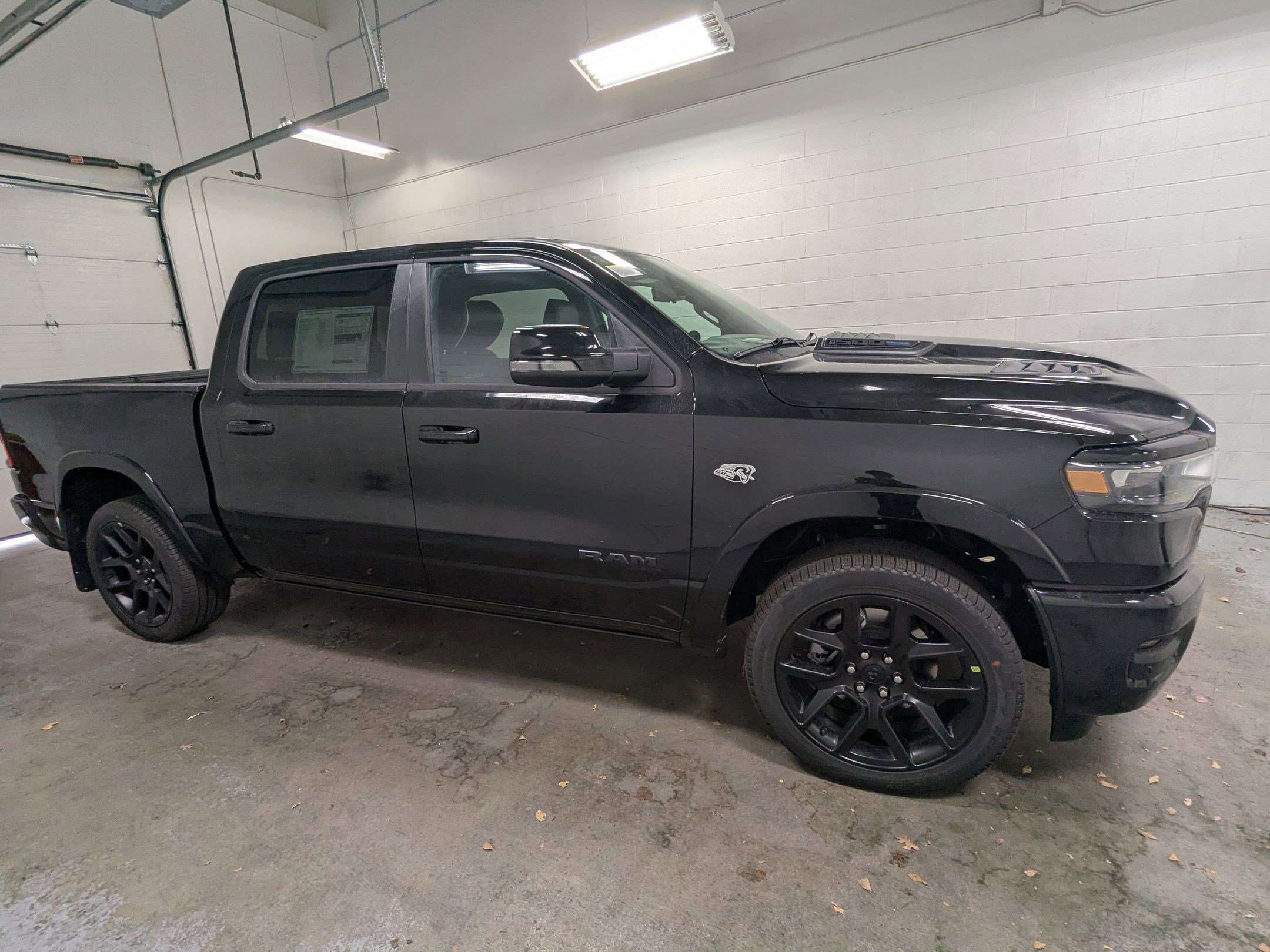 New 2026 Diamond Black Crystal Pearl-Coat Exterior Paint RAM Laramie image 3