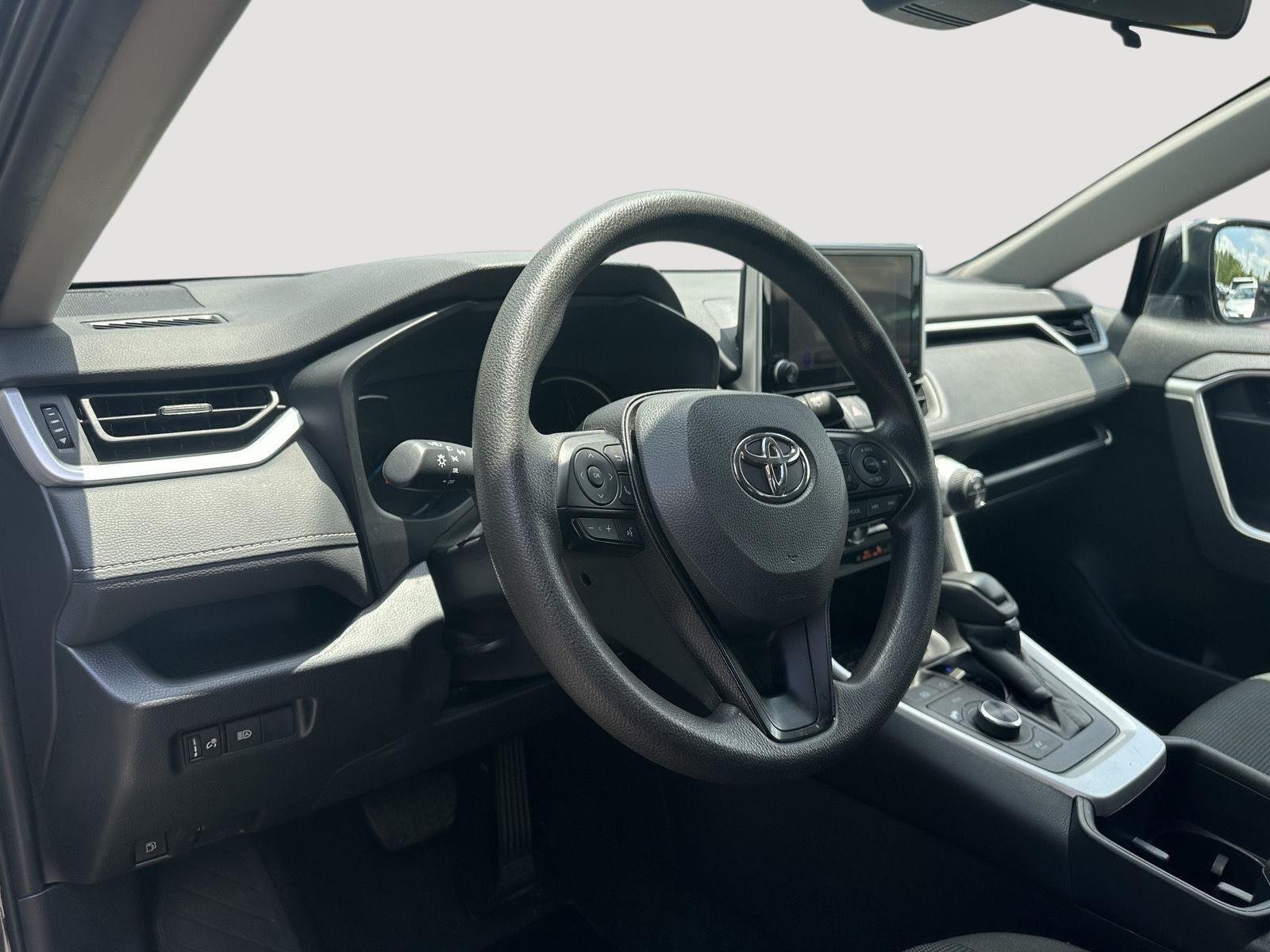 Used 2025 Midnight Black Metallic Toyota Hybrid LE image 11