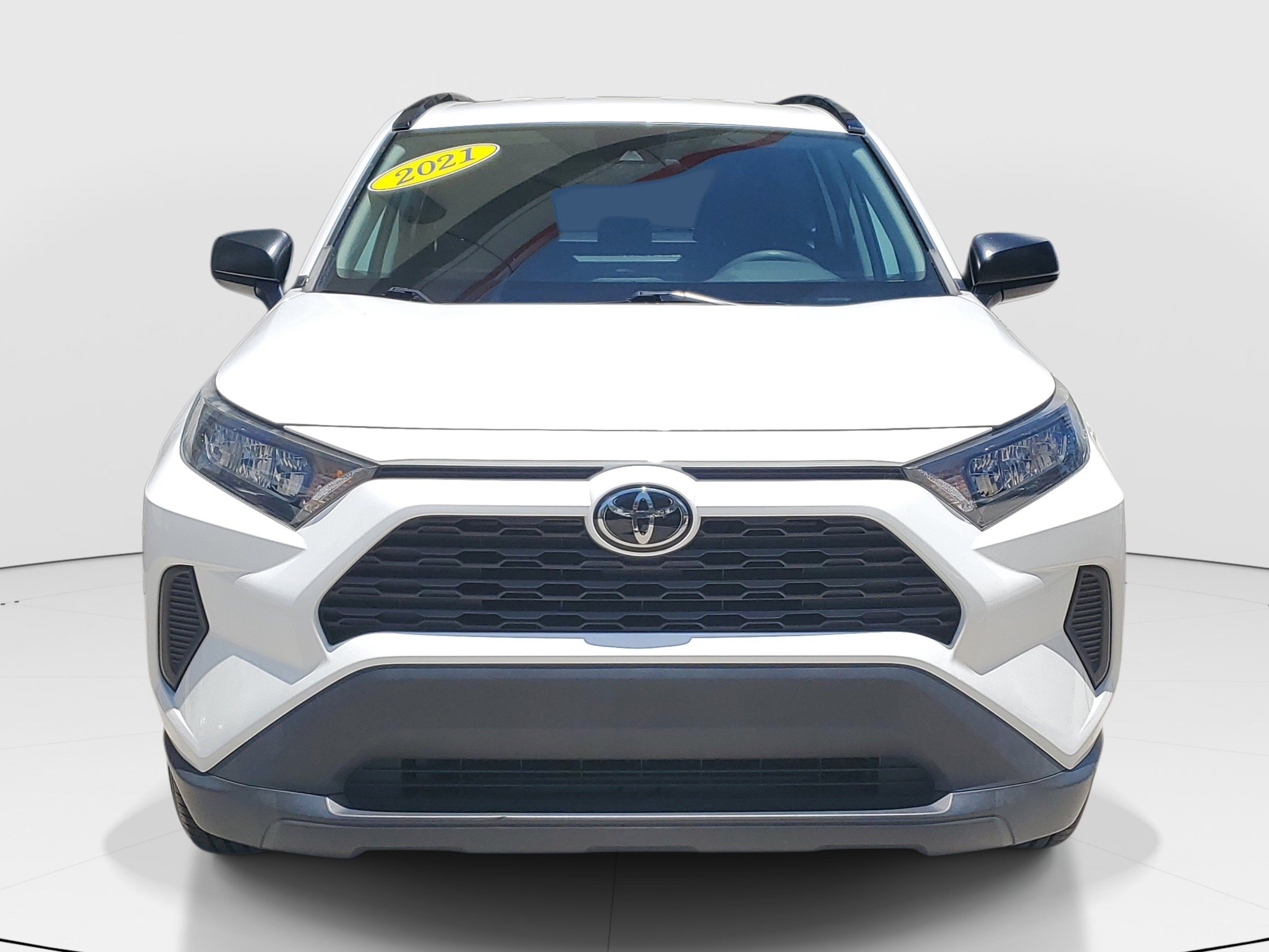 Used 2021 Super White Toyota LE image 2