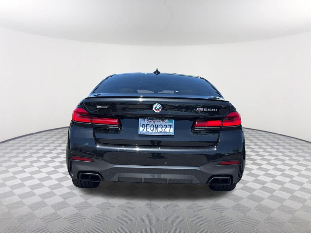 Used 2023 Black BMW M550i xDrive image 5