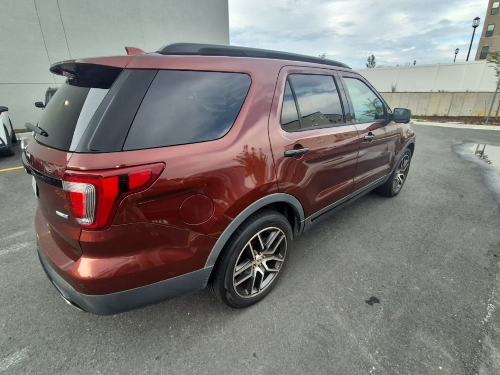 Used 2016 Ruby Red Metallic Tinted Clearcoat Ford Sport image 5