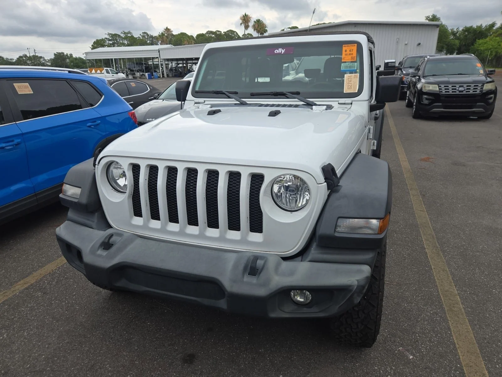 Used 2022 Bright White Clearcoat Jeep Unlimited Sport image 1