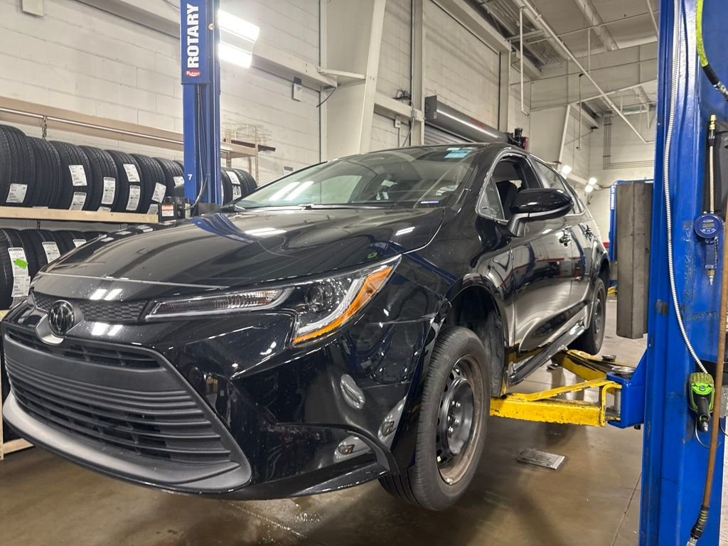 Used 2025 Black Toyota LE image 1