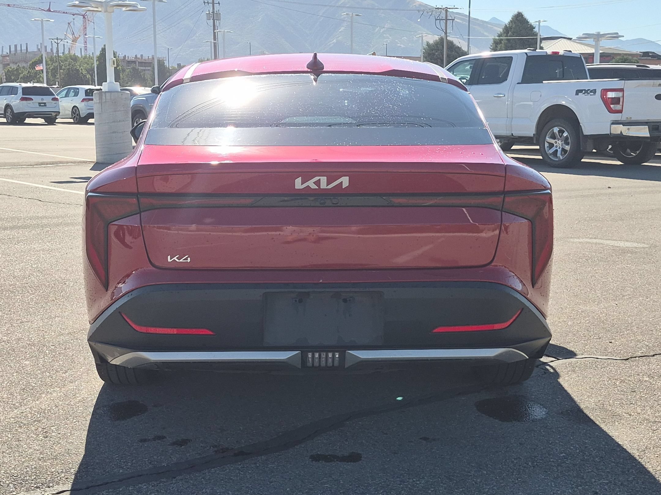 Used 2025 Currant Red Kia EX image 4