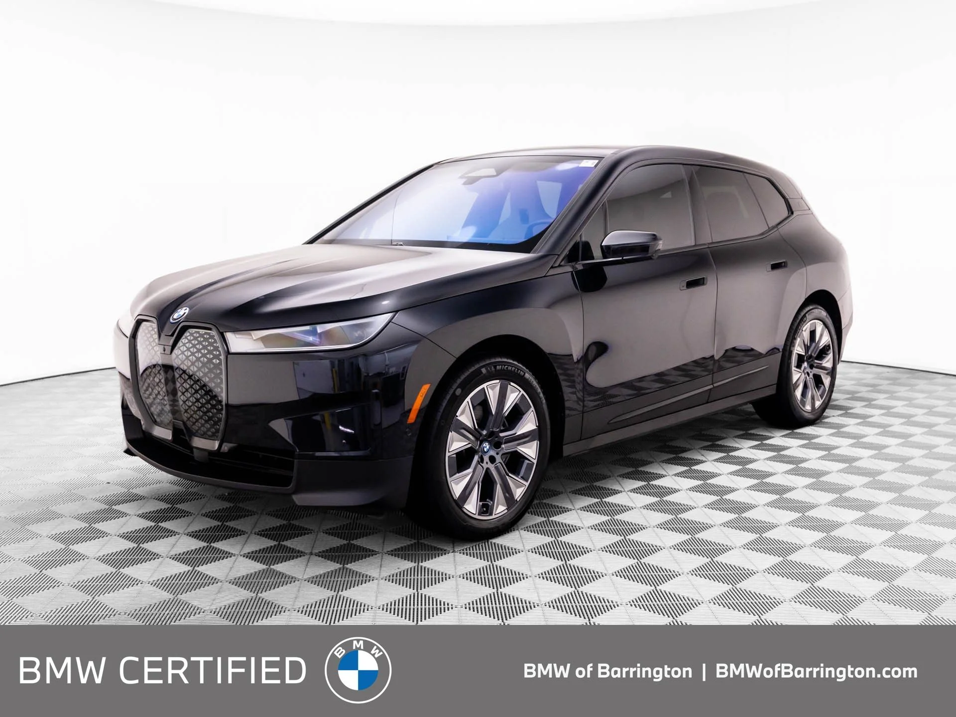 Certified Used 2024 Black BMW xDrive50 image 1