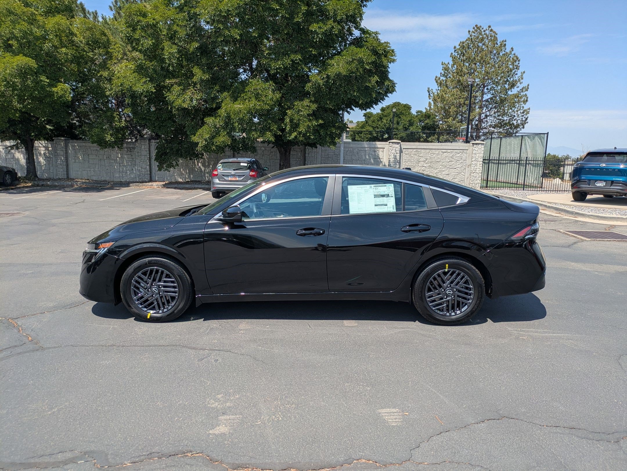 New 2026 Super Black Nissan SV image 7