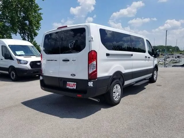 New 2026 Oxford White Ford Passenger Van XLT image 9