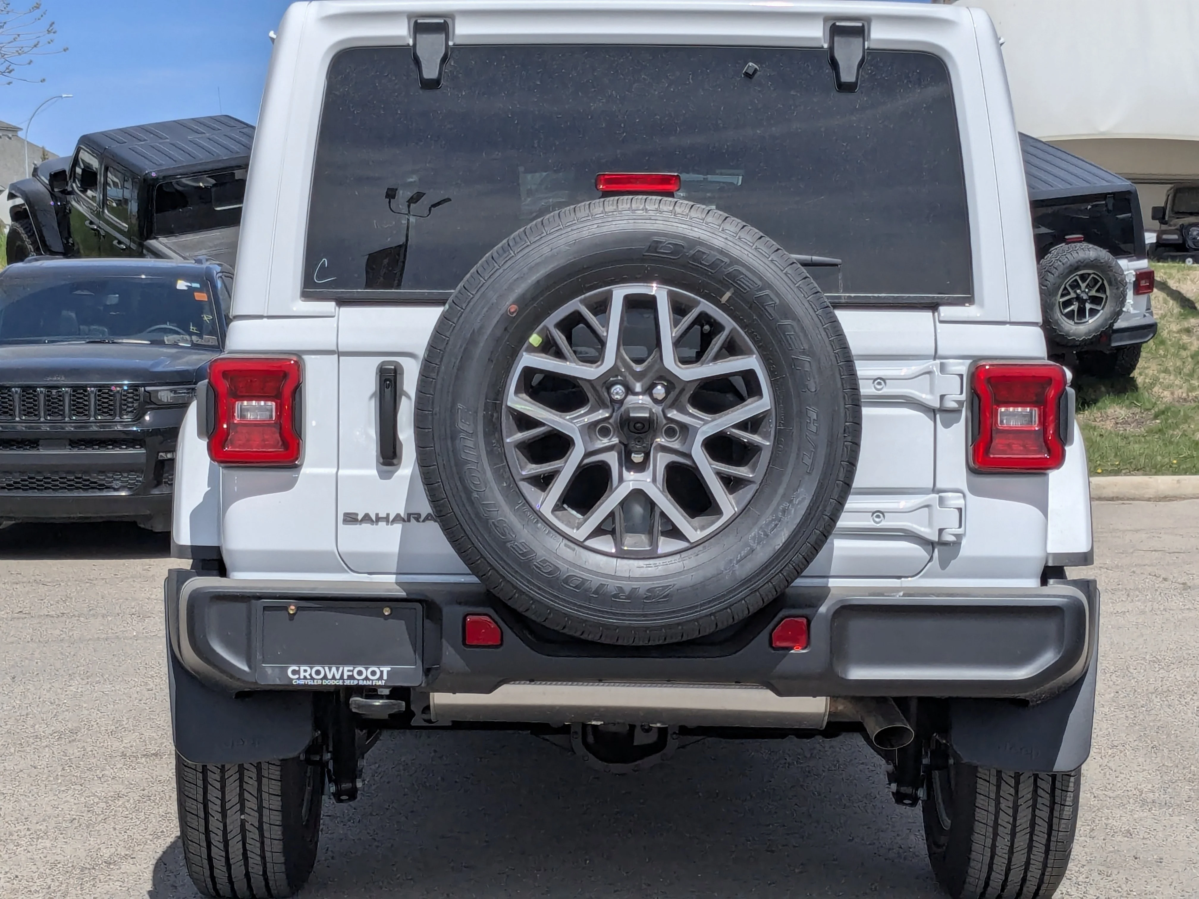 New 2026 White Jeep Sahara - - Body-Color Top - Side Steps - 2.0L Turbo - Remote Start & tons more! image 7