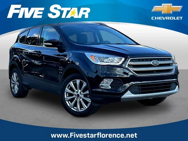 Used 2017 Black Ford Titanium image 1