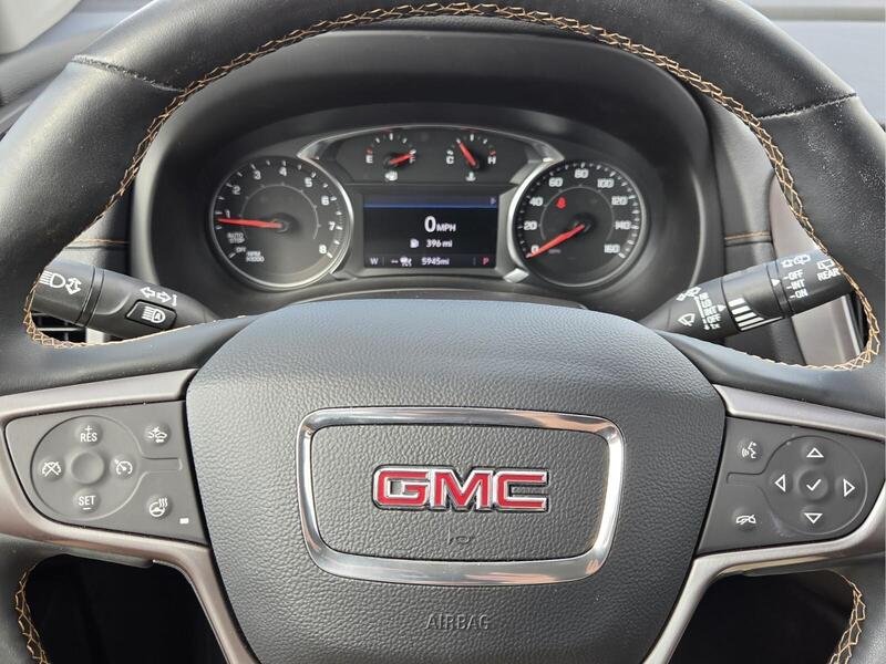 Used 2024 Ebony Twilight Metallic GMC AWD 4DR AT4 image 31