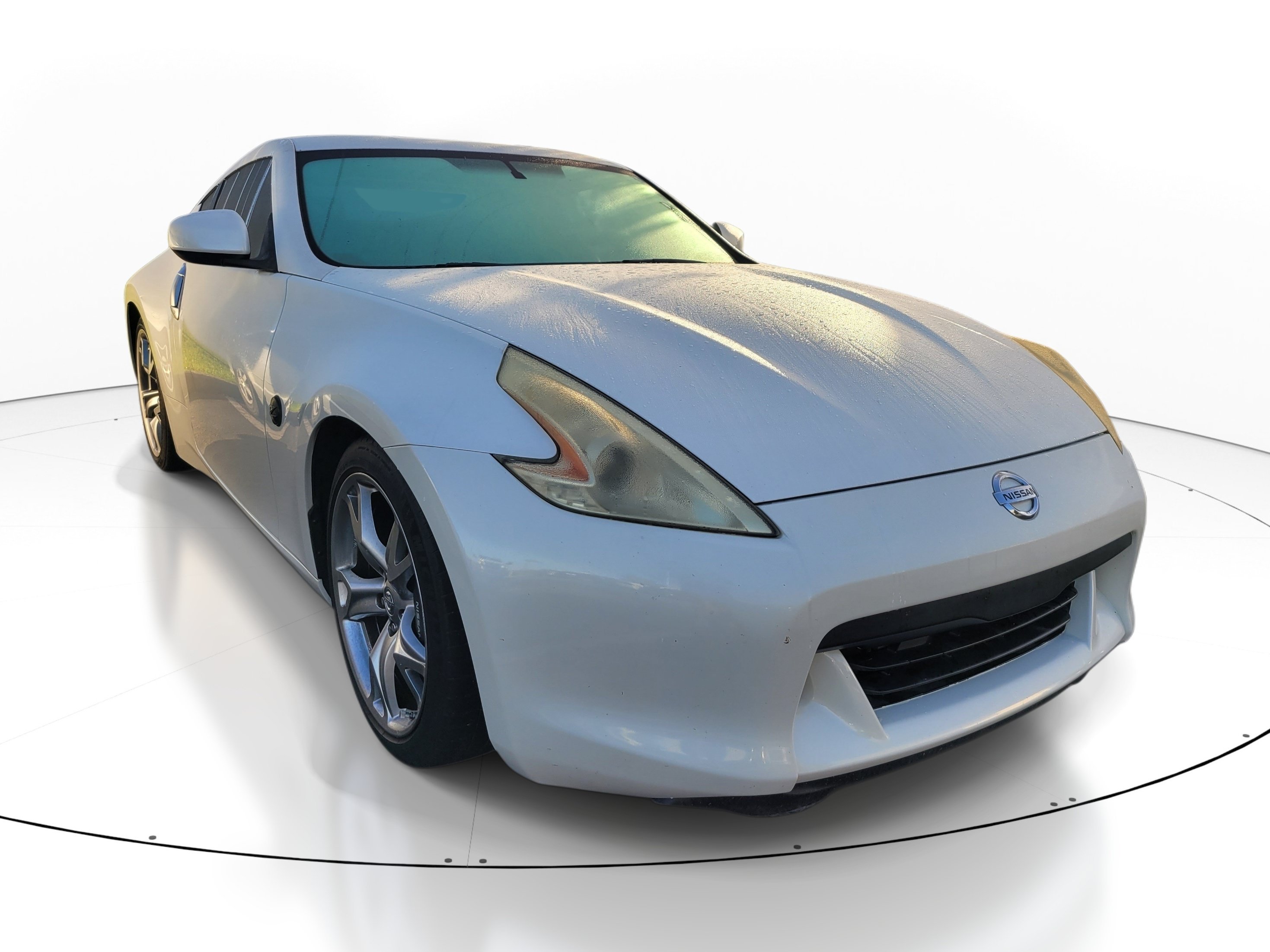 Used 2012 Pearl White Nissan Base image 1