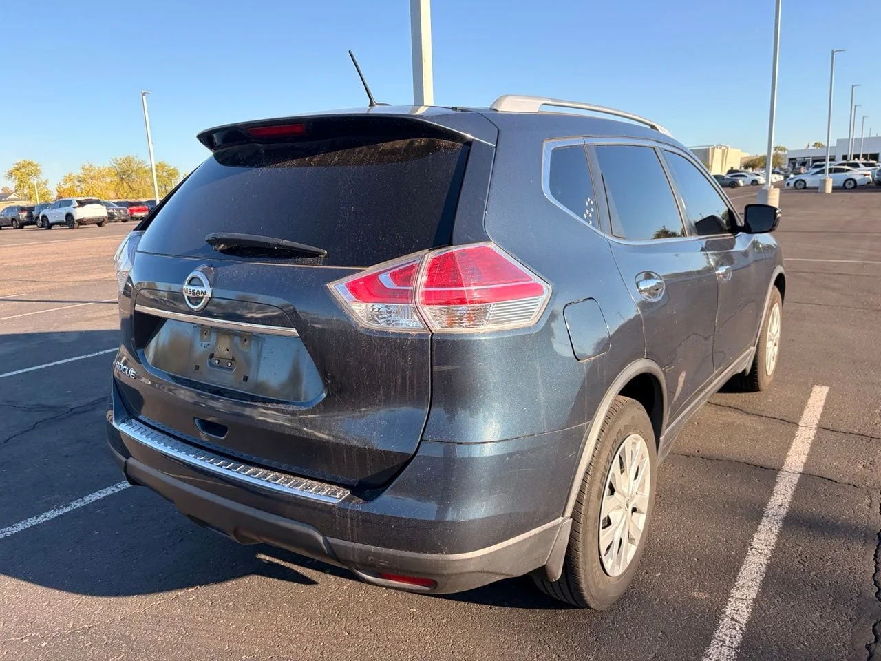 Used 2016 Arctic Blue Metallic Nissan S image 4