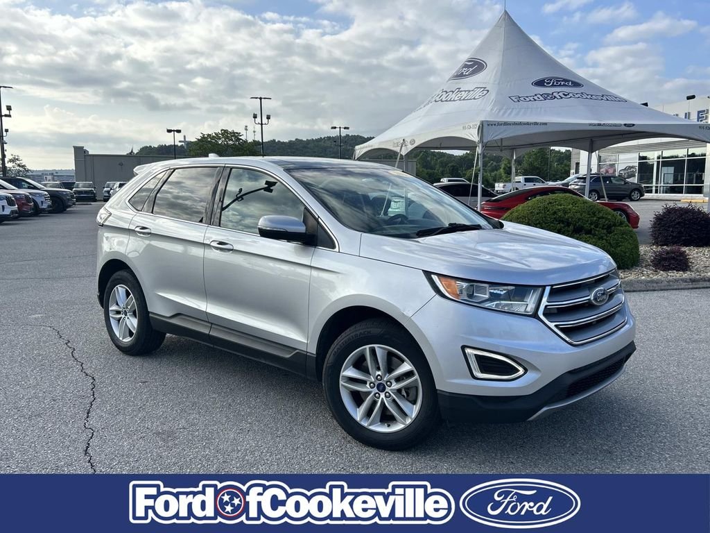 Used 2016 Ingot Silver Ford SEL image 1