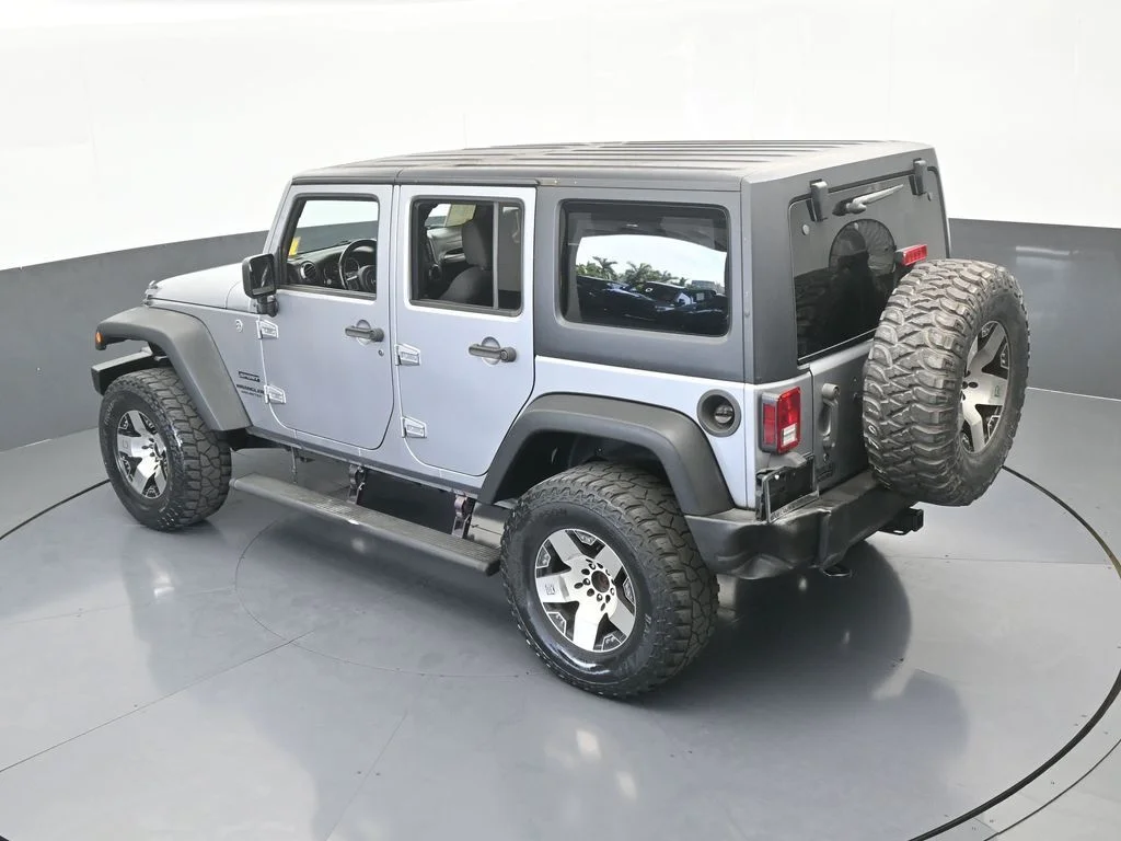Used 2016 Billet Silver Metallic Clearcoat Jeep Unlimited Sport image 48
