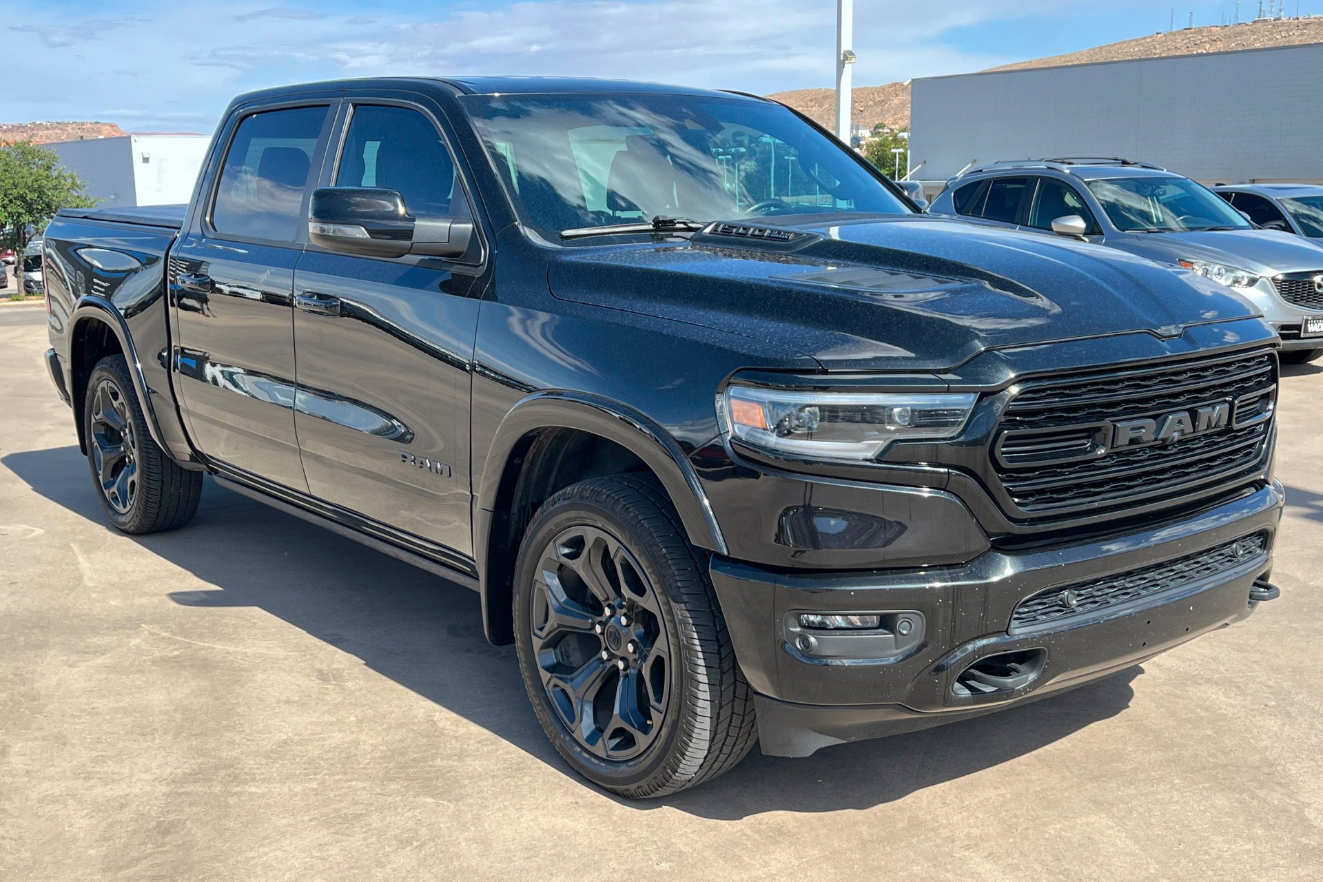 Used 2024 Diamond Black Crystal Pearlcoat Ram Limited image 8