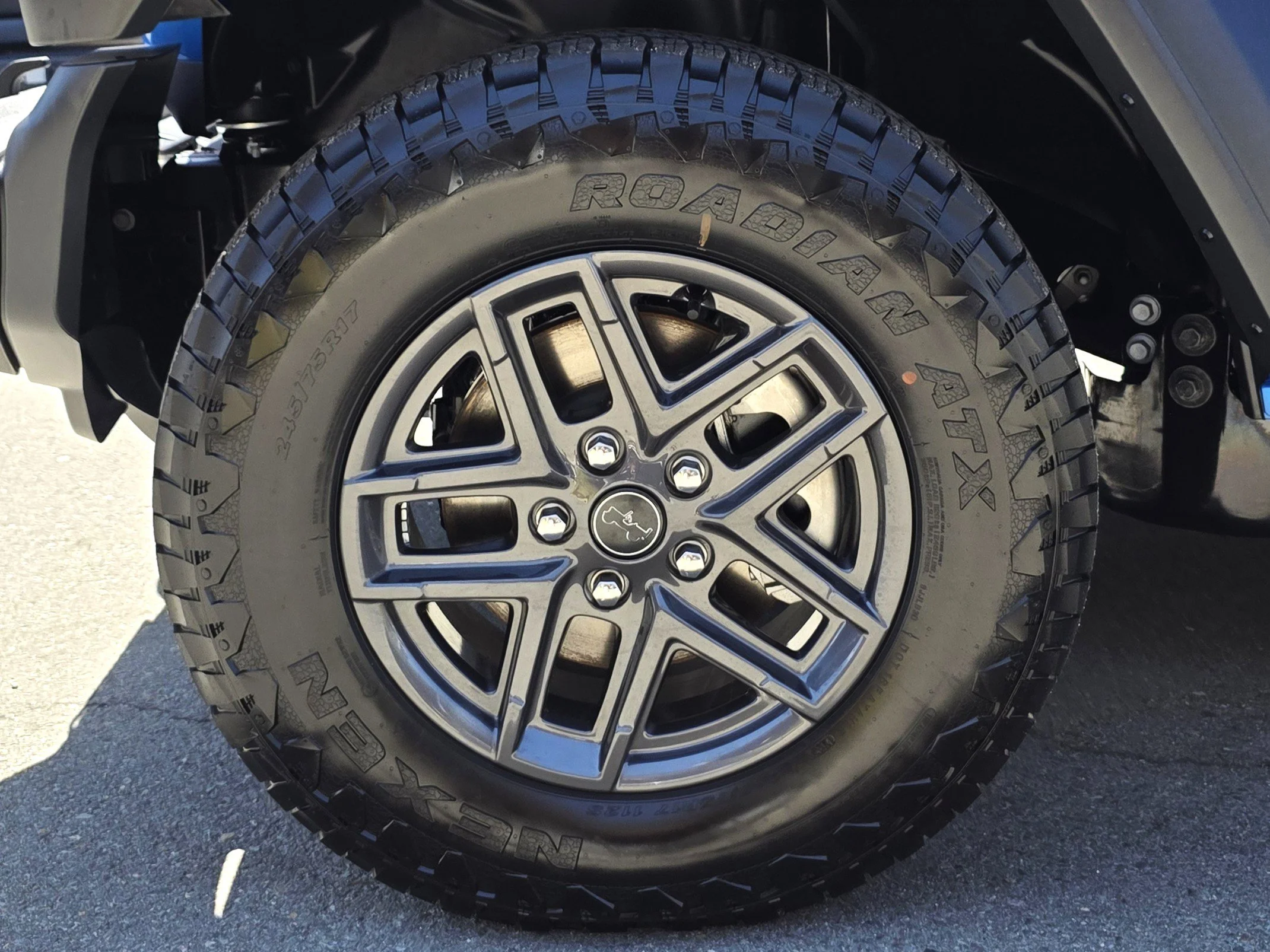 New 2026 Blue Pearl Jeep Sport S image 9