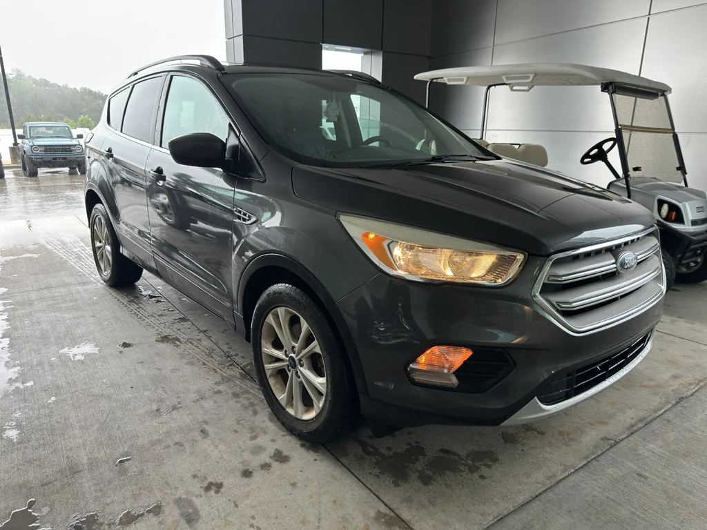 Used 2018 Ford Escape SE with VIN 1FMCU0GD1JUA11010 for sale in Hattiesburg, MS