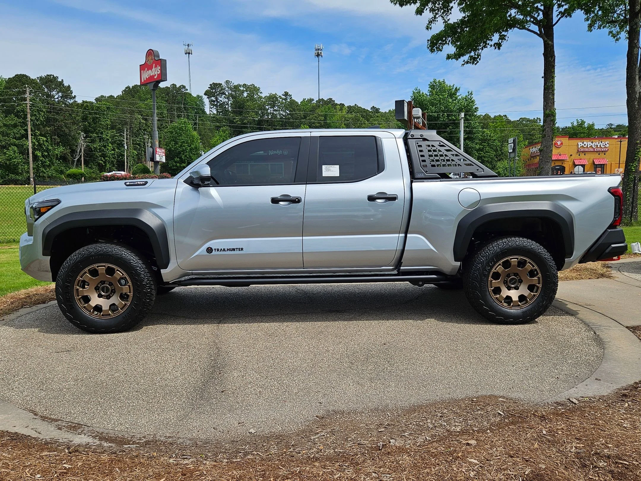 New 2026 Celestial Silver Metallic Toyota Trailhunter Hybrid image 4