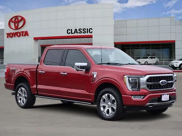 Used 2022 Red Metallic Ford Platinum image 1