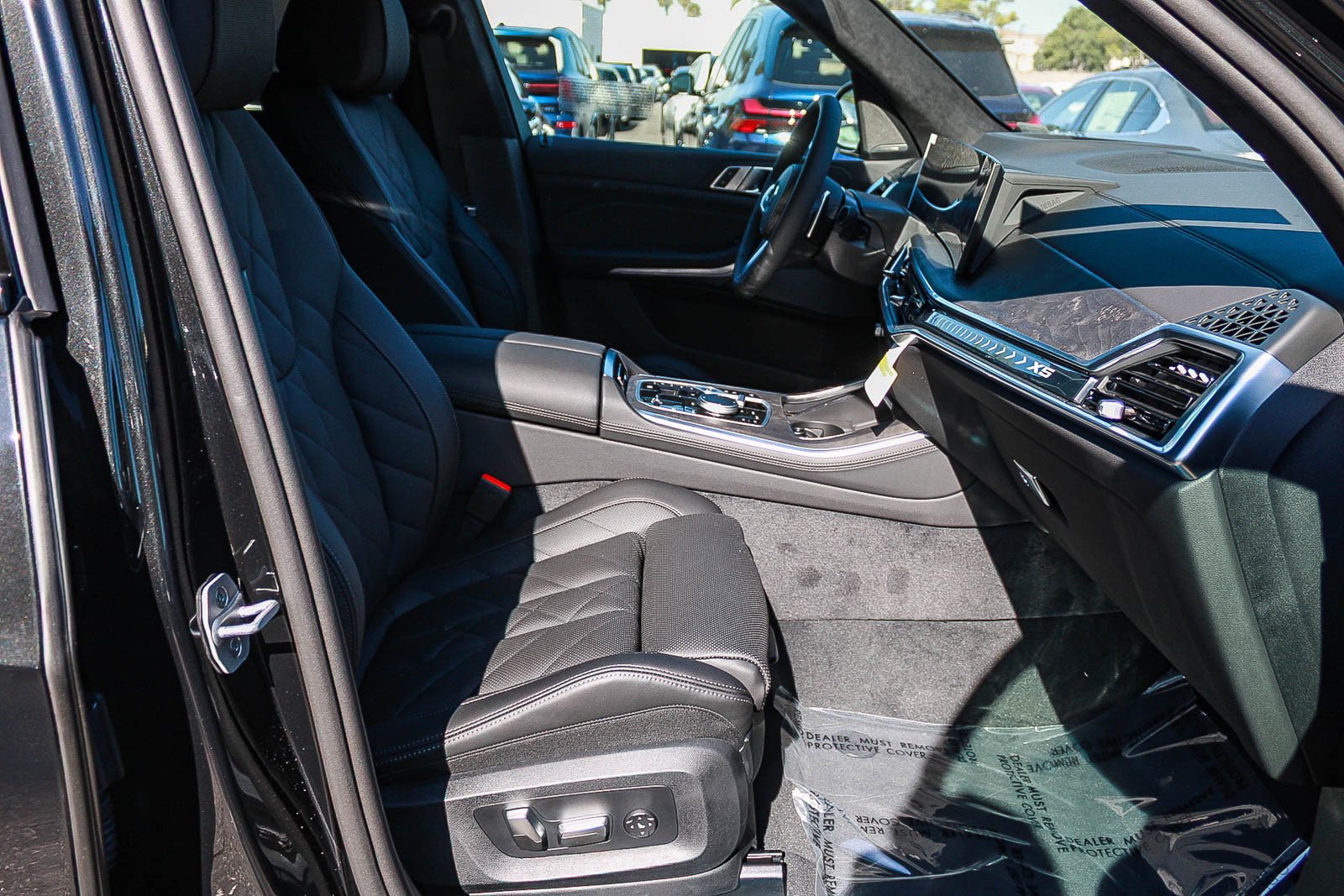 New 2026 Black Sapphire Metallic BMW xDrive50e image 16