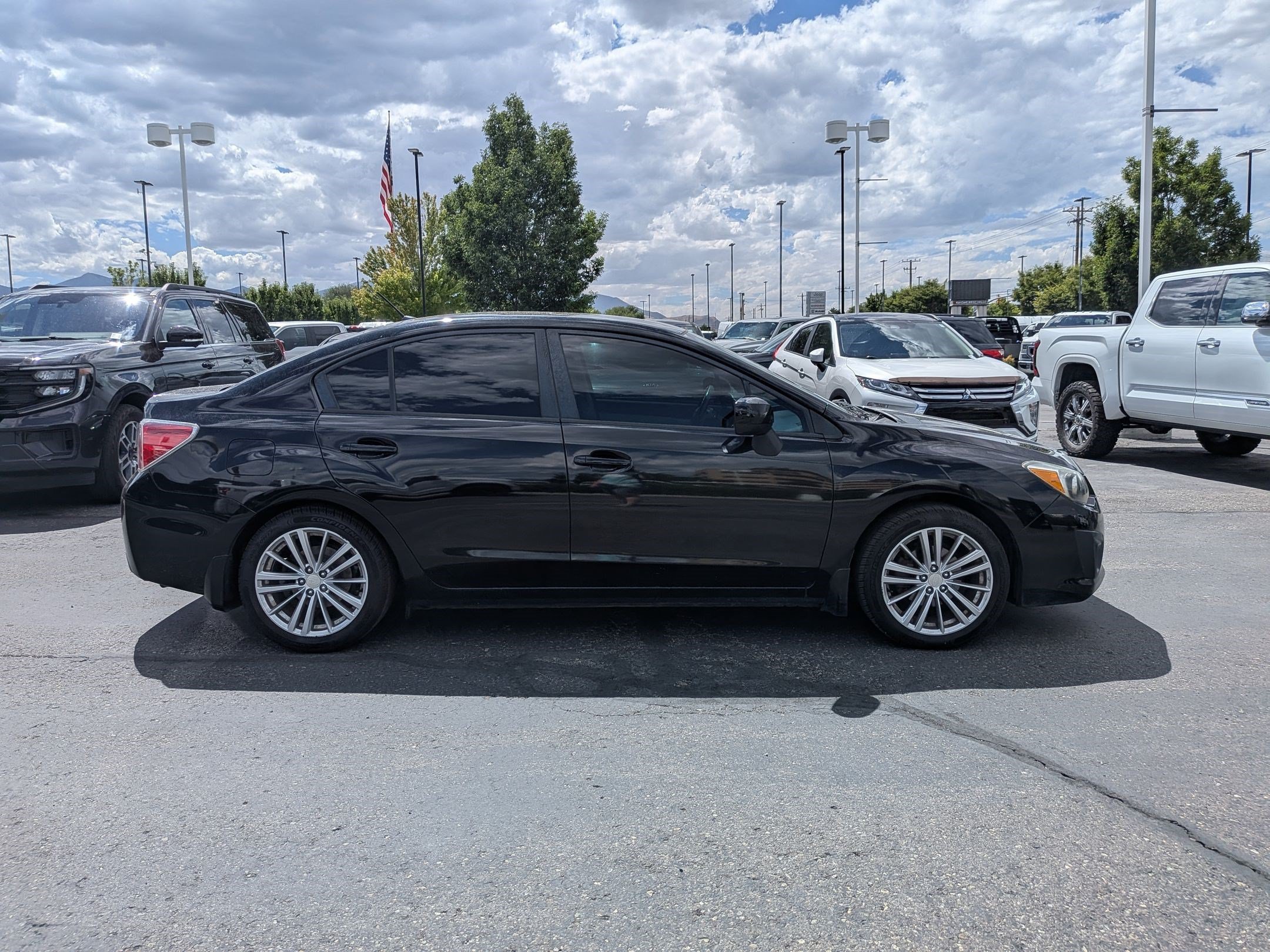 Used 2012 Subaru Impreza 2.0I Premium with VIN JF1GJAD62CG002883 for sale in West Valley City, UT