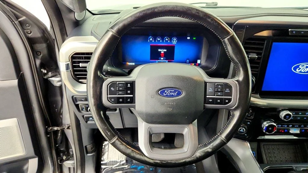 Used 2024 Carbonized Gray Metallic Ford LARIAT 4WD SuperCrew 5.5