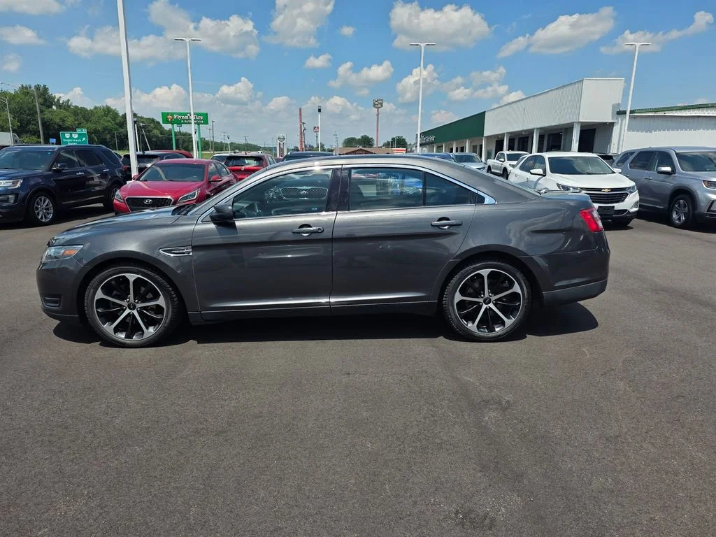 Used 2015 Magnetic Metallic Ford SEL image 6