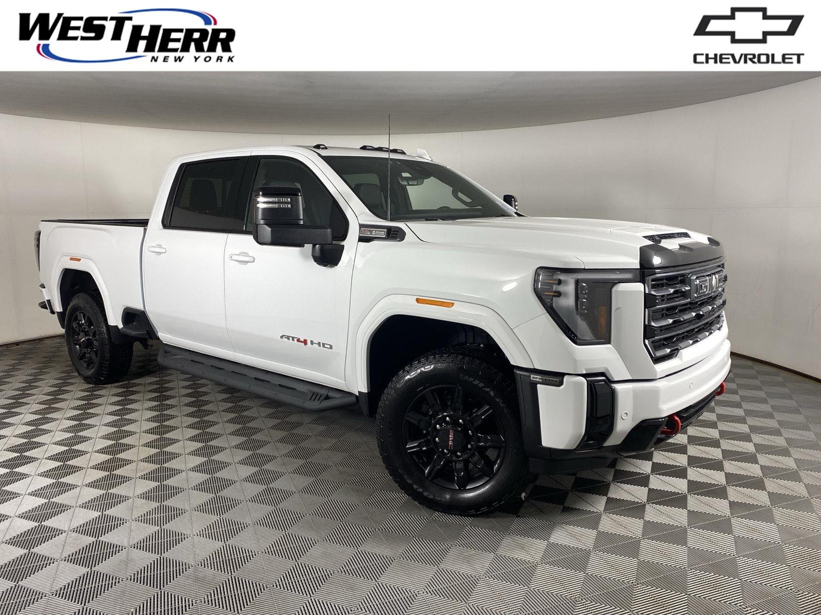 Used 2025 Summit White GMC AT4 image 1