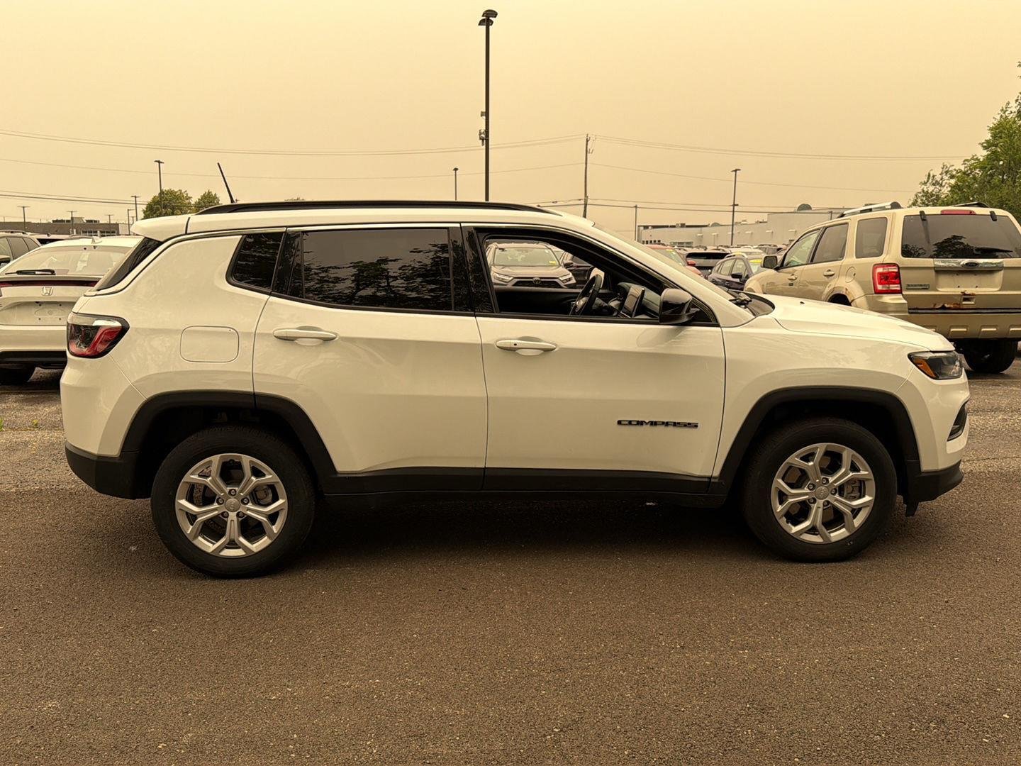 Used 2024 Bright White Clearcoat Jeep Latitude image 7