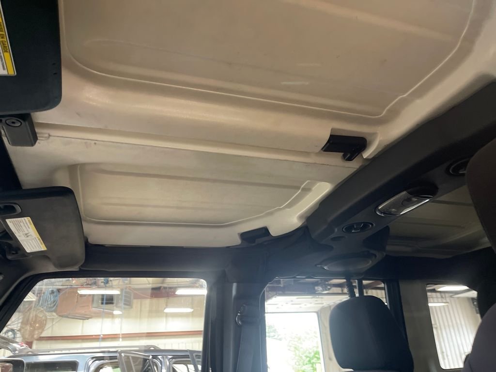 Used 2013 Black Jeep Unlimited Sport image 13