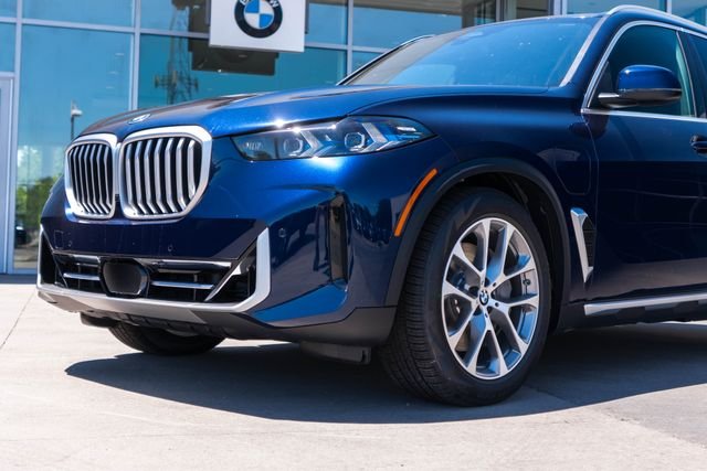 New 2026 Tanzanite Blue II Metallic BMW xDrive50e image 6