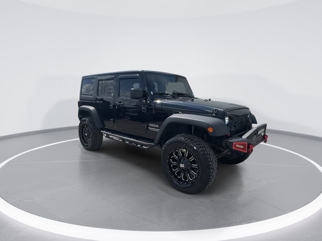 Used 2015 Black Jeep Unlimited Sport image 2