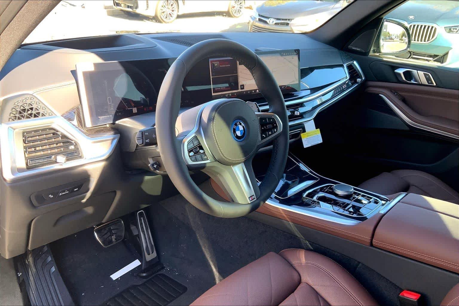 New 2026 Black Sapphire Metallic BMW xDrive50e image 8