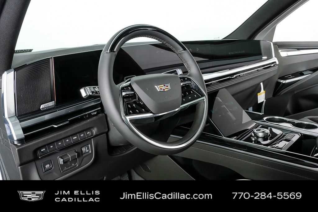 Used 2026 Vibrant White Tricoat Cadillac Sport image 3