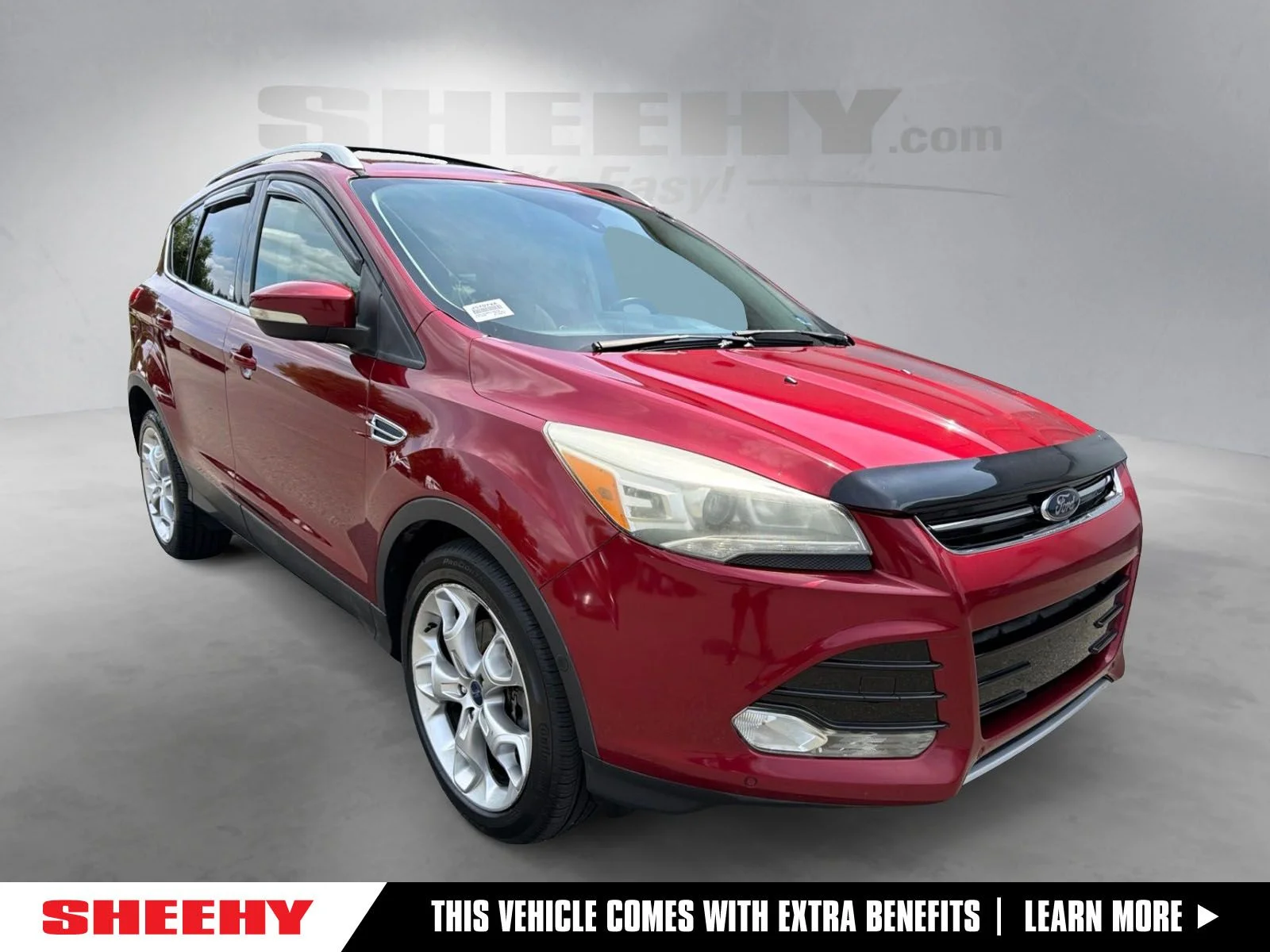 Used 2016 Red Ford Titanium image 1