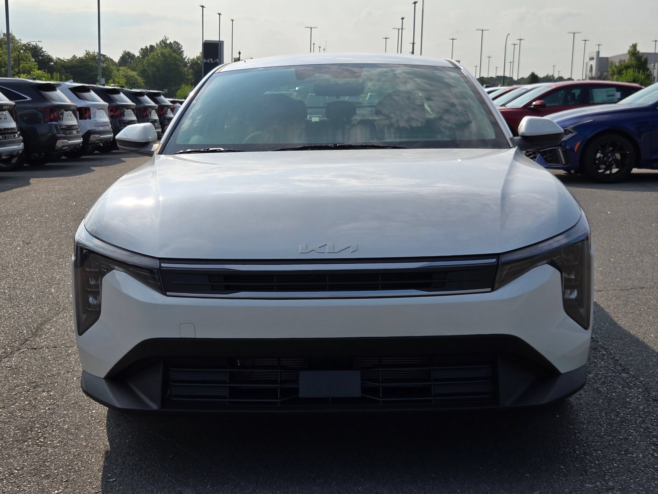 New 2026 Snow White Pearl Kia LXS image 2