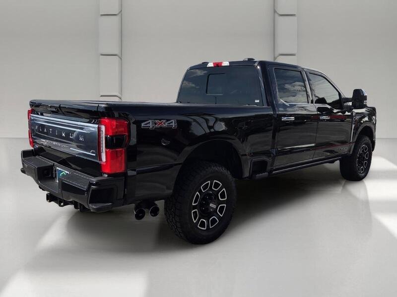 Used 2024 Black Metallic FORD PLATINUM 4WD CREW CAB 6.75