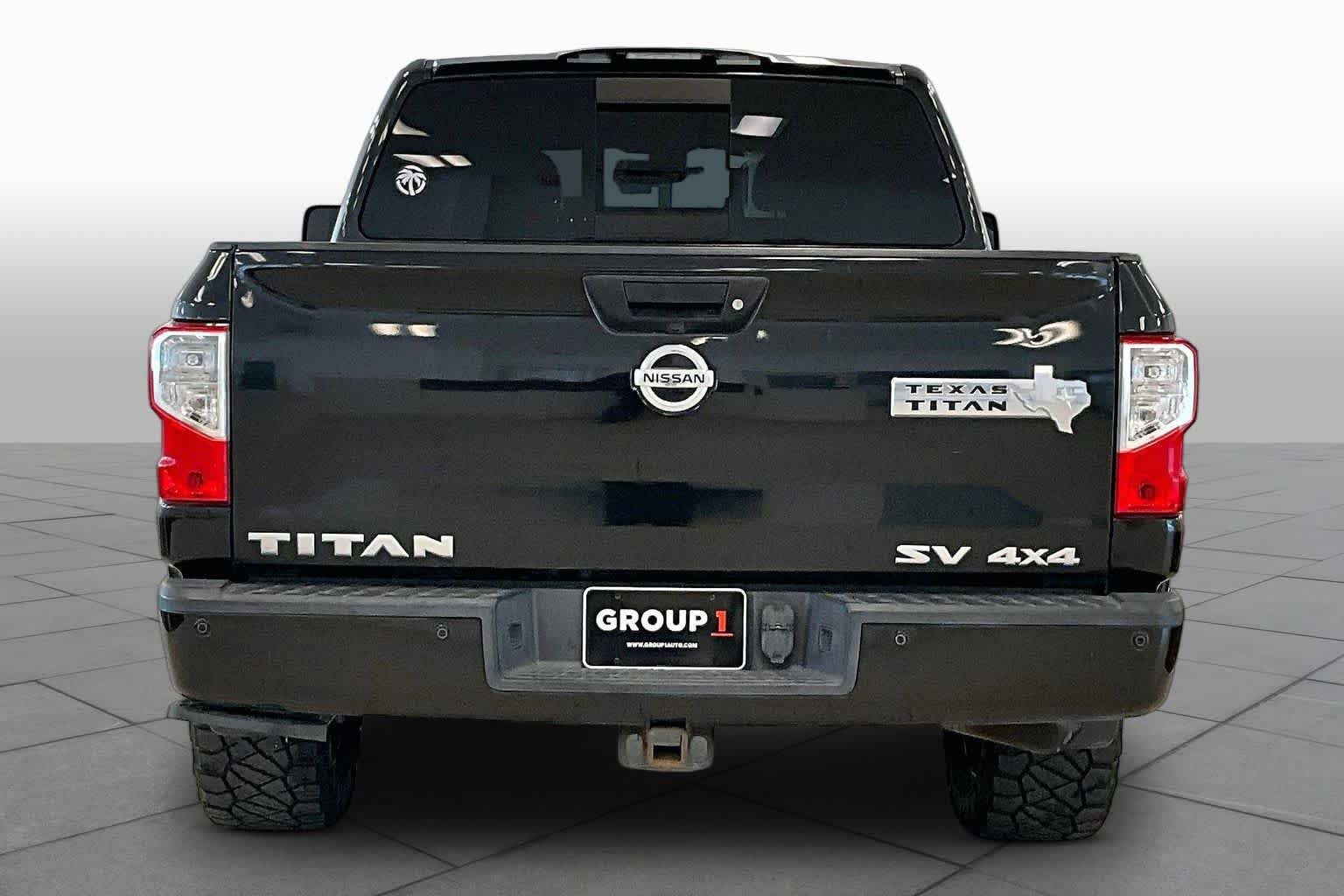 Used 2019 Magnetic Black Metallic Nissan SV image 4