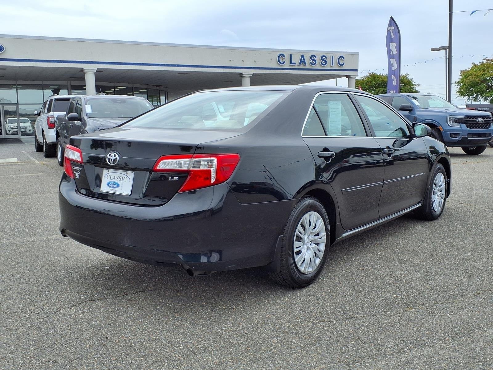 Used 2012 Attitude Black Metallic Toyota LE image 2
