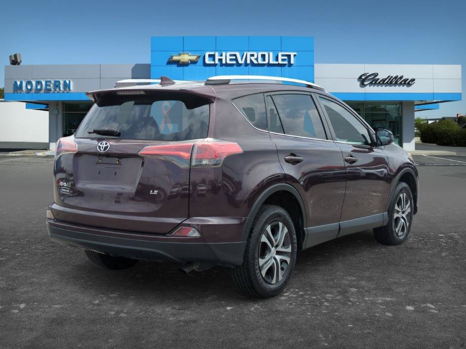 Used 2016 Black Currant Metallic Toyota LE image 5