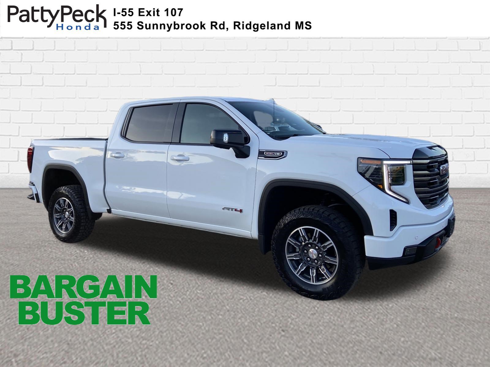 Used 2025 Summit White GMC AT4 image 1