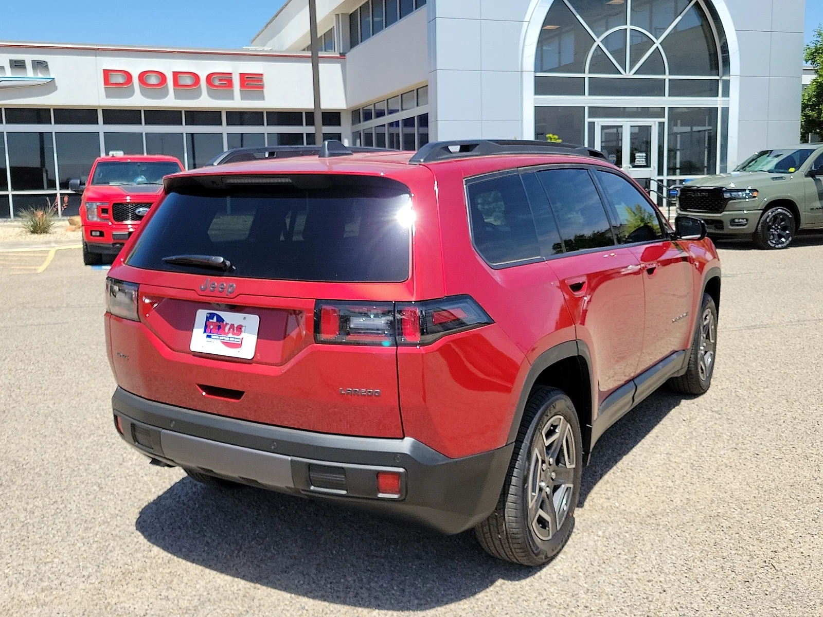 New 2026 Red Hot Pearlcoat Jeep LAREDO 4X4 image 4