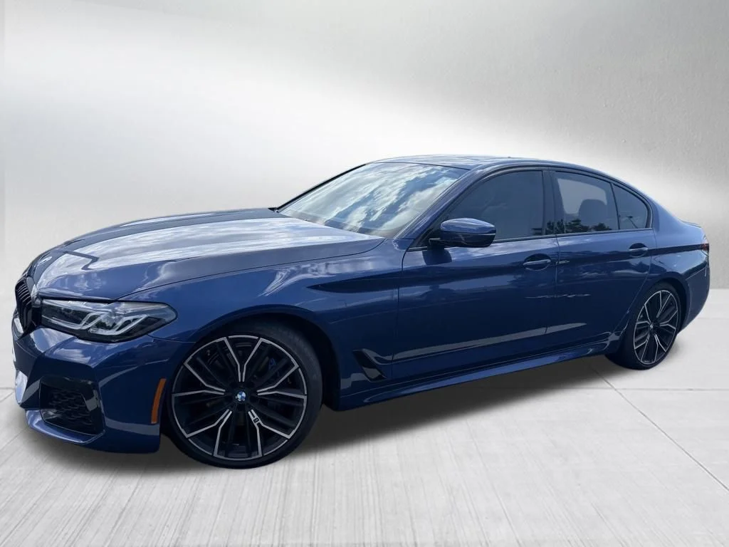 Used 2023 Blue BMW 530i xDrive image 1
