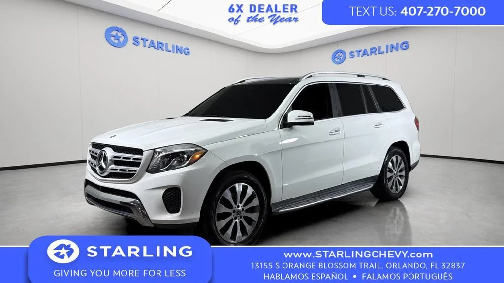 Used 2019 Red Mercedes-Benz 4MATIC® image 1